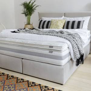 Jak materac nawierzchniowy może poprawić komfort snu?