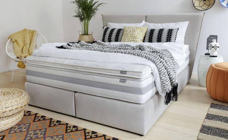 Jak materac nawierzchniowy może poprawić komfort snu?