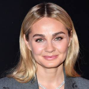 Dyskusja pod nowym zdjęciem Małgorzaty Sochy. Trzyma transparent „Nie mam macicy”