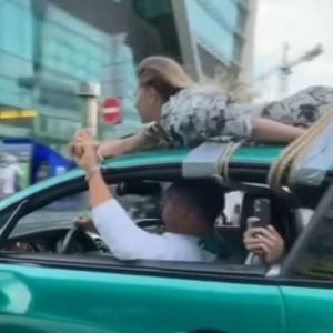 Youtuber przywiązał swoją dziewczynę do dachu samochodu i przejechał przez całe miasto. Zrobił to w ramach "testu zaufania"
